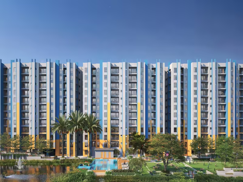Front elevation of DTC Good Earth towers across the natural pond