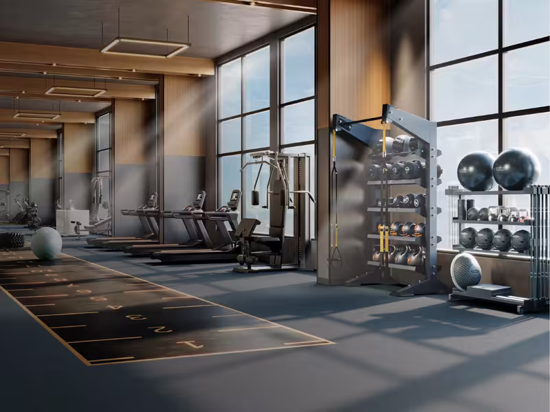 Clubhouse gym with full-height windows